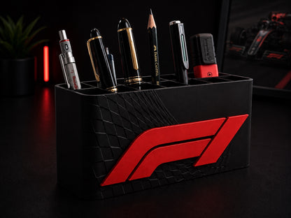 Titan Multi-Slot Desk Organizer holding pens and pencils, red racing emblem on front