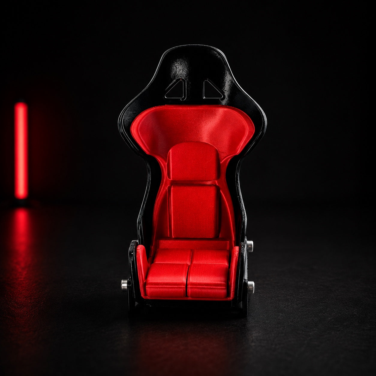Titan Racing Seat Phone Stand — front view of the red-and-black racing bucket seat