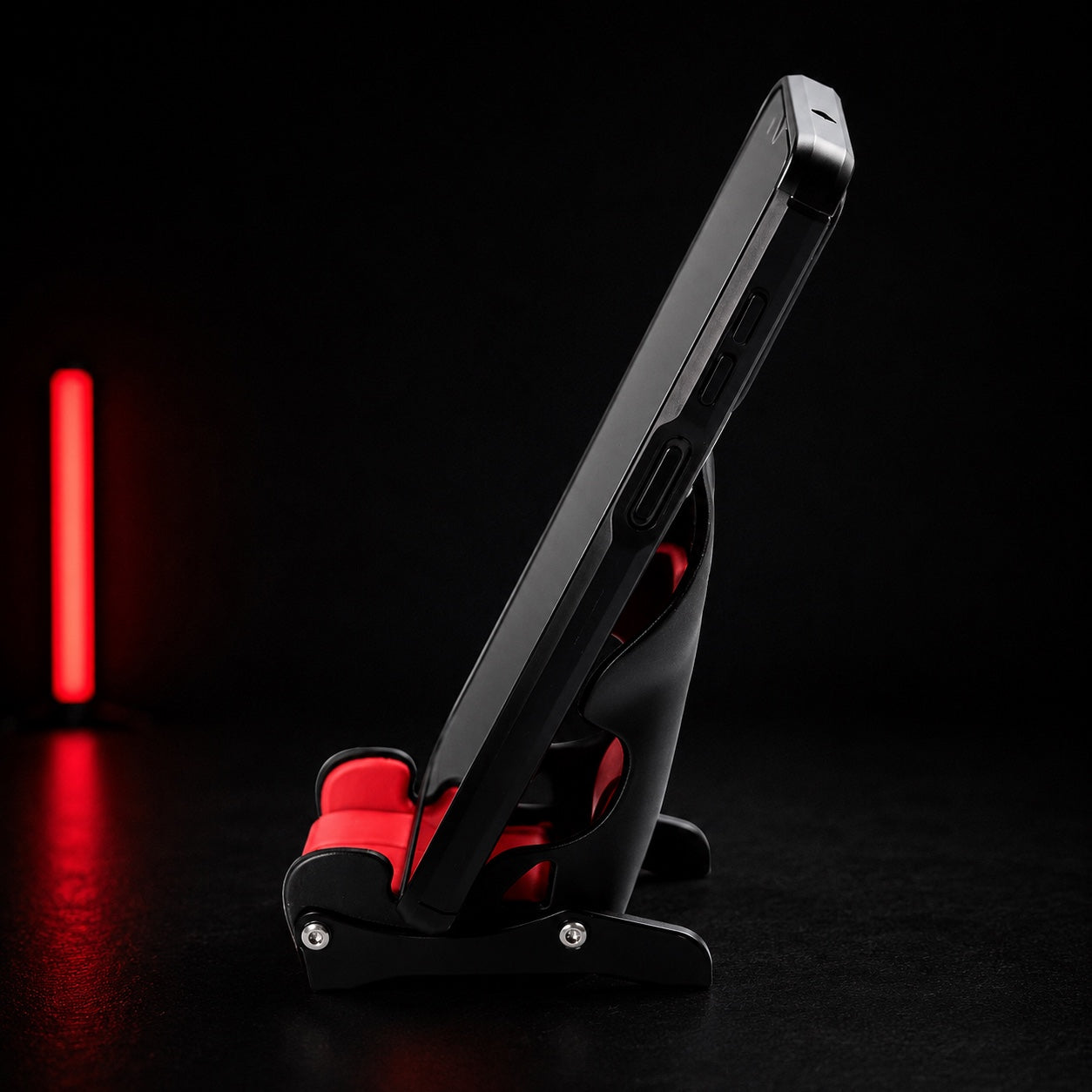 Titan Racing Seat Phone Stand — side view with phone resting in the seat